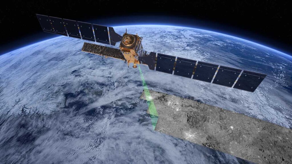 Artistieke impressie van Sentinel-1C die met radar het aardoppervlak observeert.